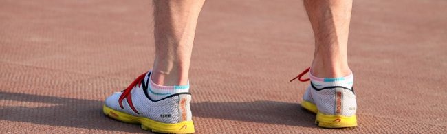 BF-hardloopplateau-1600×480 Newton Laufschuhe für Elite-Athleten auf rotem Belag für maximalen Trainingserfolg.