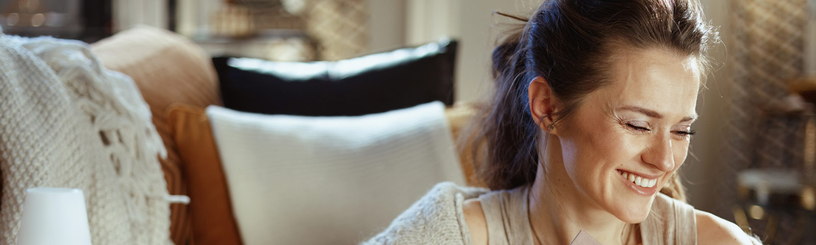 A colorful display of avocado, whole grains, nuts, seeds, avocado, chocolate, and oily fish on a wooden board, showcasing nutrient-rich foods for hormonal balance.