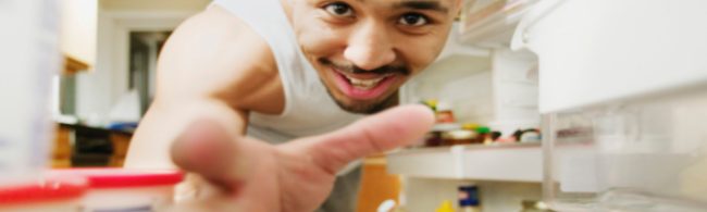 Smart refrigerator with interior cameras, organized shelves and labeled containers of fresh produce