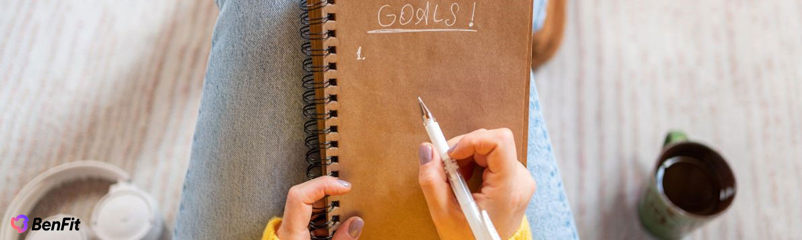 Fresh start concept with notebook, pen and healthy lifestyle elements symbolizing new year opportunities