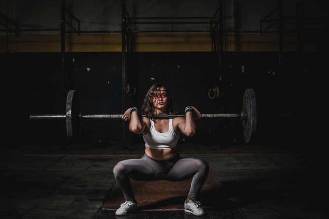 picture of a woman performing heavy lifts