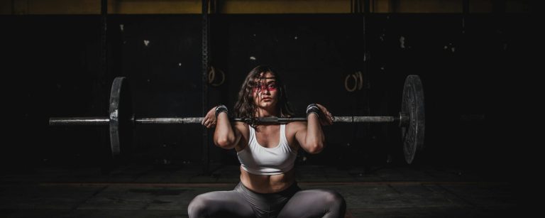 picture of a woman performing heavy lifts